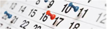 LfK Veranstaltungskalender - rote und weiße Pins auf einem Kalender